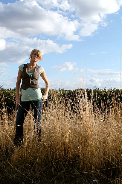 istock Young Woman in a Field 116143058