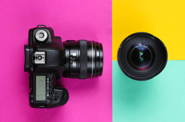 istock Camera with lens on a pastel colored background. Top view, minimalism 1161430733