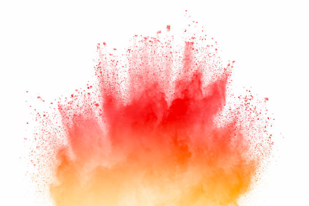 Stopping the movement of multicolored dust on white background. Explosion of multicolored dust on white background. orange burst stock pictures, royalty-free photos & images