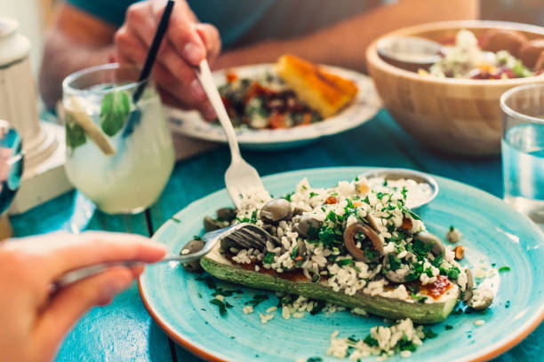Shot of a healthy vegan meal with zucchini, manna croup and coriander