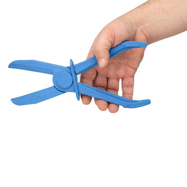 istock pliers for crimping wires in a hand on a white background 1161435328