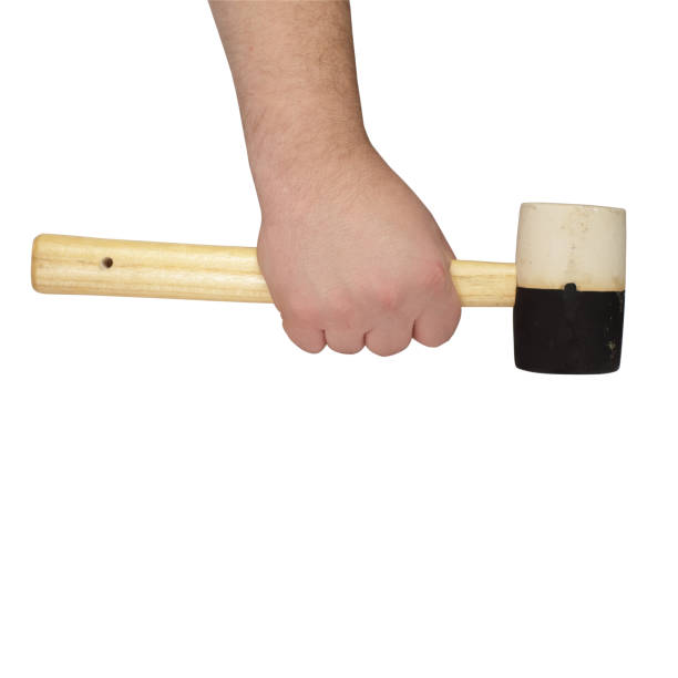 istock rubber hammer in a hand on a white background 1161436168