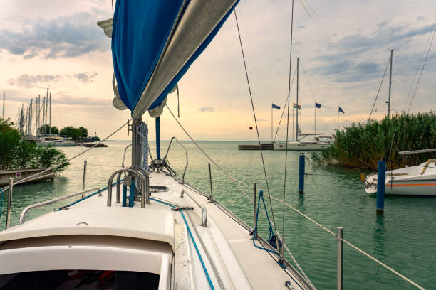 Sailboat on the lake Balaton ship prow view .