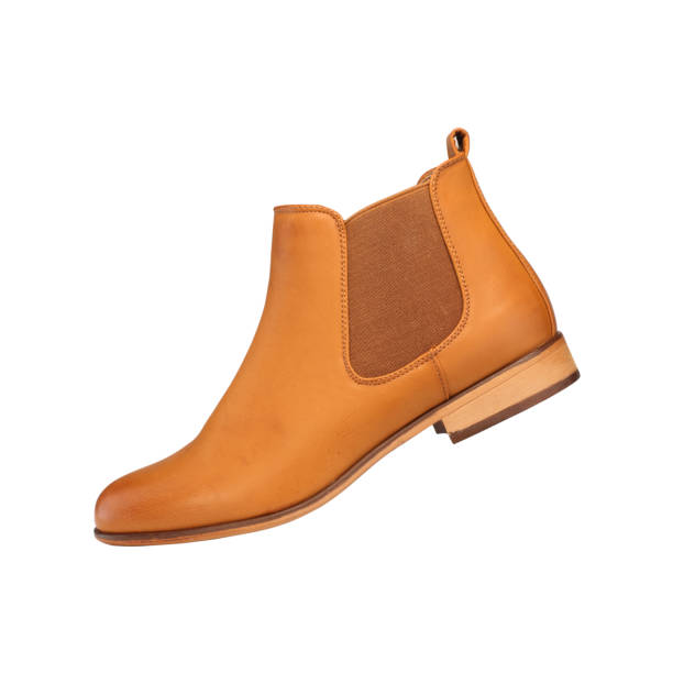 istock orange leather shoes on a white background 1161437461