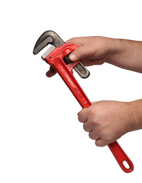 istock a hydraulic wrench in a hand on a white background 1161437817