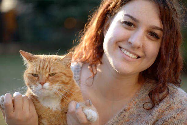 istock Woman and Cat ( summer) 1161438137