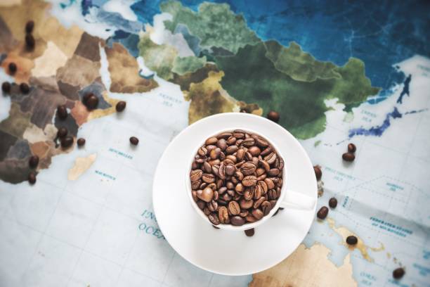 istock roasted coffee bean on vintage world map 1161438146