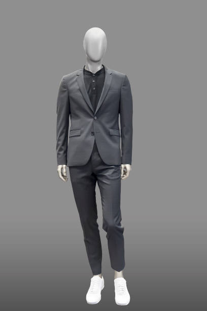 Full-length male mannequin. Full-length male mannequin dressed in fashionable suit, isolated. No brand names or copyright objects. mannequin photos stock pictures, royalty-free photos & images