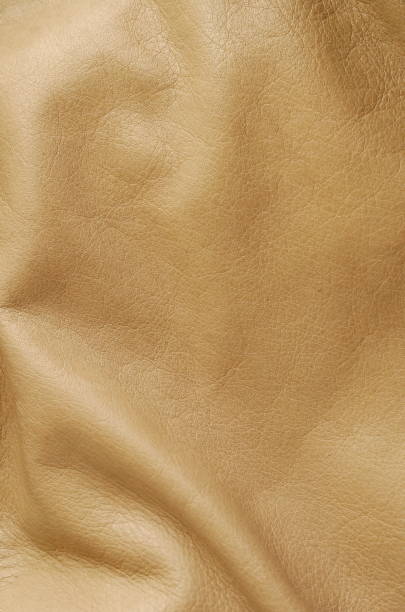 istock Natural beige leather texture background close up full frame 1161439405
