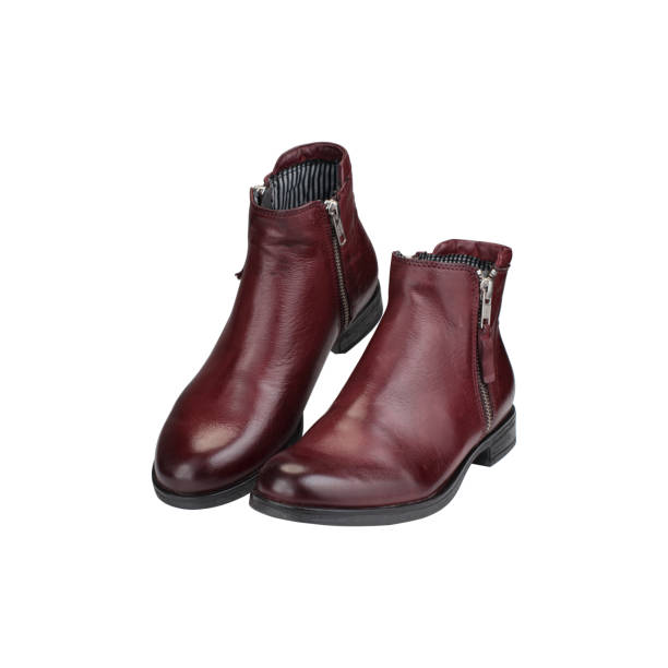 istock brown women's boots on a white background 1161440938