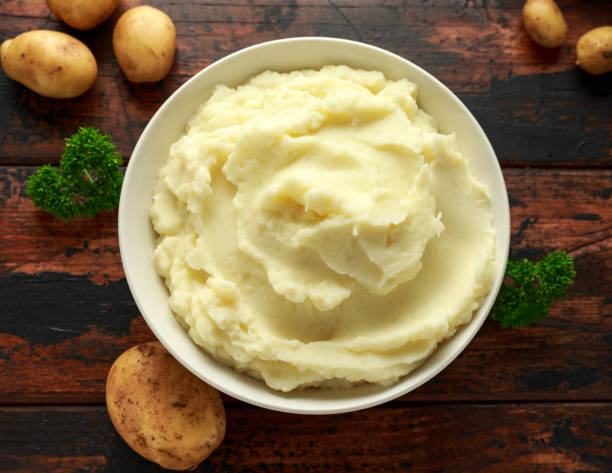 istock Mashed potatoes in white bowl on wooden rustic table. Healthy food 1161443747
