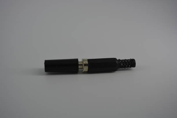 istock Black plugs with metal tips for electricity and electrical. 1161446059