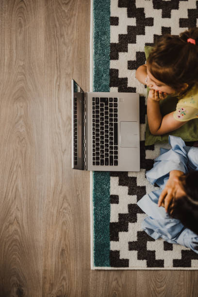 istock Mother working at home with her daughter 1161446965