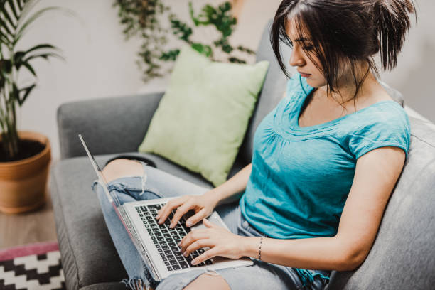 istock Young business woman working with laptop computer 1161447138