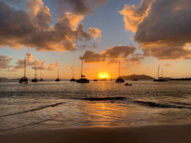 istock Sunset and Sailboats 1161448162