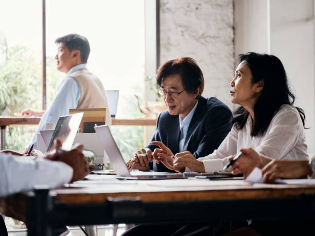 istock Professionals Working in a Co-working Space in Taipei Taiwan 1161449174