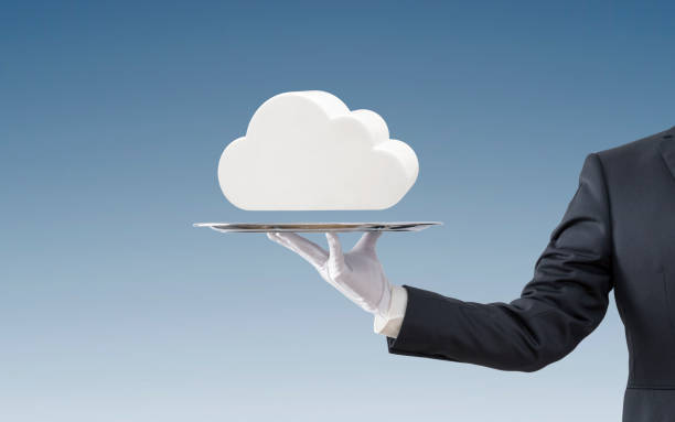 businessman offering white cloud on silver tray over blue background - tray glove butler white imagens e fotografias de stock