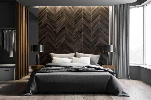 istock Gray and dark wooden bedroom interior, wardrobe 1161456399