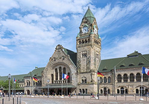 Metz, France - May 15, 2018: Gare de Metz-Ville - main railway station serving the city of Metz, capital of Lorraine. The neo-Romanesque building was built in 1905-1908 by German architect Jurgen Kroger and opened on August 17, 1908.