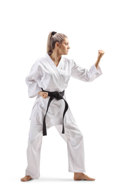 istock Young woman practicing martial arts 1161460525