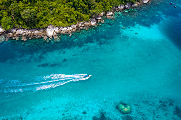 istock The fast boat passes through a small strait boat 1161460677