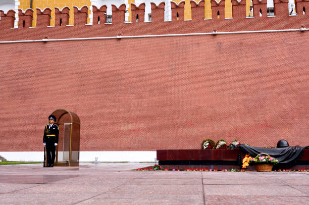 Changing of guard of honor at Moscow Kremlin in winter. Soldiers in military uniform. The famous place is Eternal Flame in memory of those killed in World War II. January 10, 2015 - Moscow, Russia.