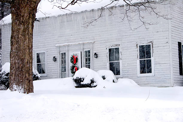 istock Old House with Christmas Wreath in Winter 116146751
