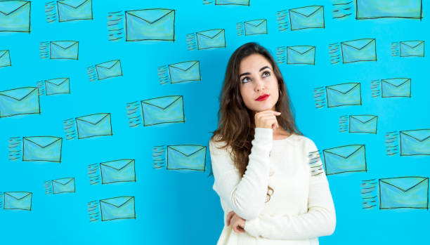 istock Emails with woman in a thoughtful pose 1161472660