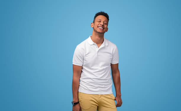 Cheerful African guy in polo shirt
