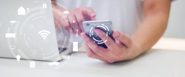 istock close up millennial man holding smartphone and turn on application for using home automation function to looking inside or outside home and property , ai innovation future technology  concept 1161476731