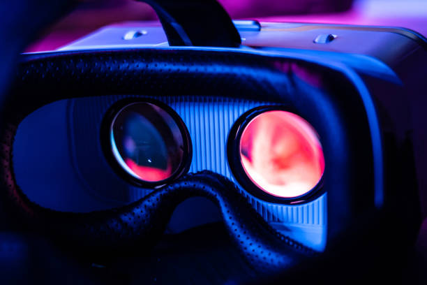 istock 3d 360 vr headset glasses goggles lenses in futuristic purple neon light, virtual augmented ar reality innovative party experience digital mobile phone technology background concept, close up view 1161476889