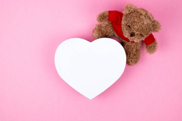istock Teddy bear, white box hearts shaped, Valentines Day gift. Present for the christmas, thanks giving day, birthday holiday. 1161487626