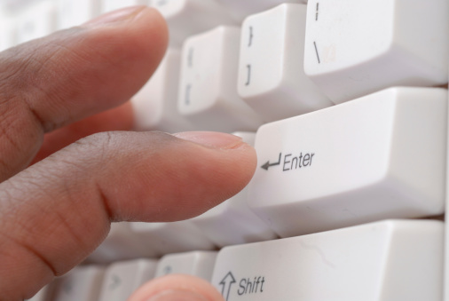 Fingers on a keyboard.