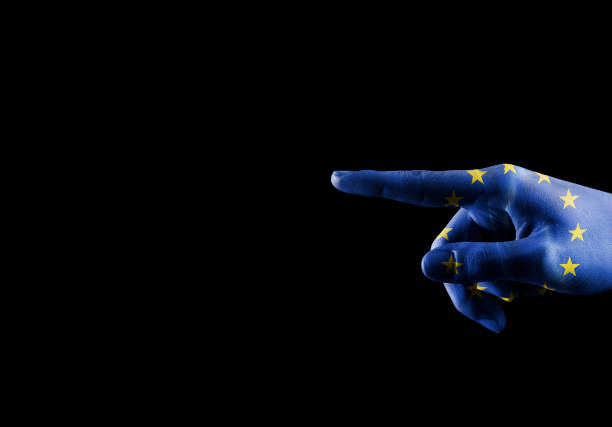 istock SHOWING - Hand with European union flag pointing over empty space for text / Flag concept (Click for more) 1161490135