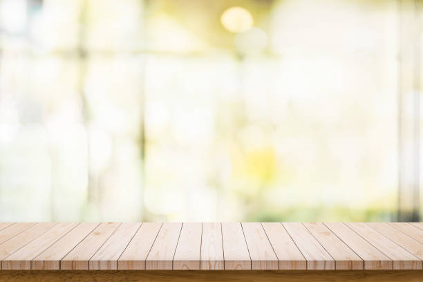 istock Empty wooden table with blur living room interior background. 1161498859