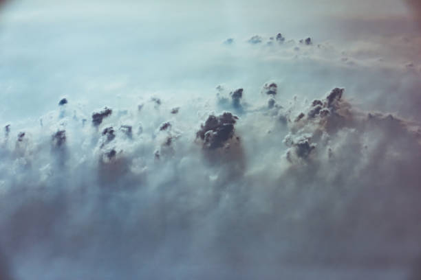 istock cloud and sky view from the window of an airplane 1161499914