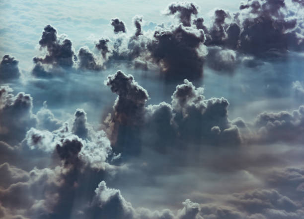 istock cloud and sky view from the window of an airplane 1161499924