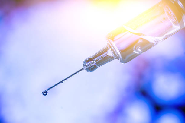 istock Image of syringe with hypodermic needle, close-up 1161503213