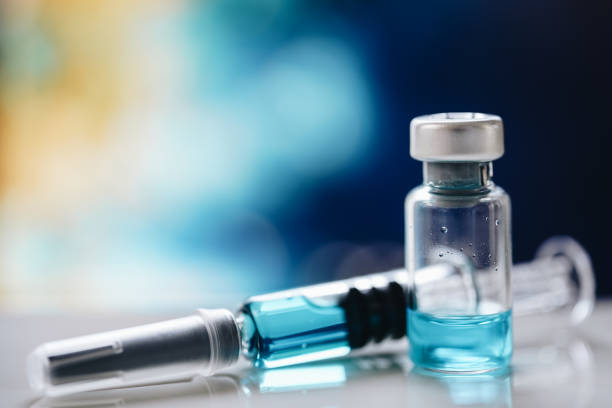 istock Injectable medications in sealed vials and a disposable plastic medical syringe 1161503281