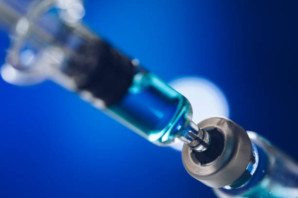 istock Vaccine vial and Syringe 1161503291