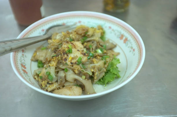 istock Stir Fried Rice Noodles with Chicken . 1161509989