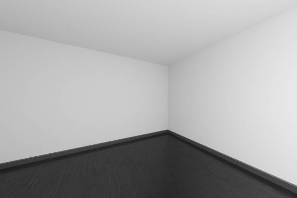 istock Empty white room with black wood parquet floor. 1161513337