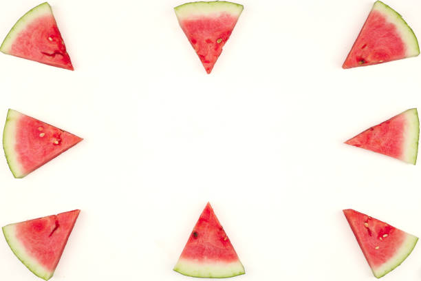 istock Triangular isolated slices of watermelon forming geometric games for copy space on a white background 1161514067