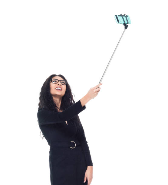 istock Attractive latino busineswoman is doing a selfie 1161514467