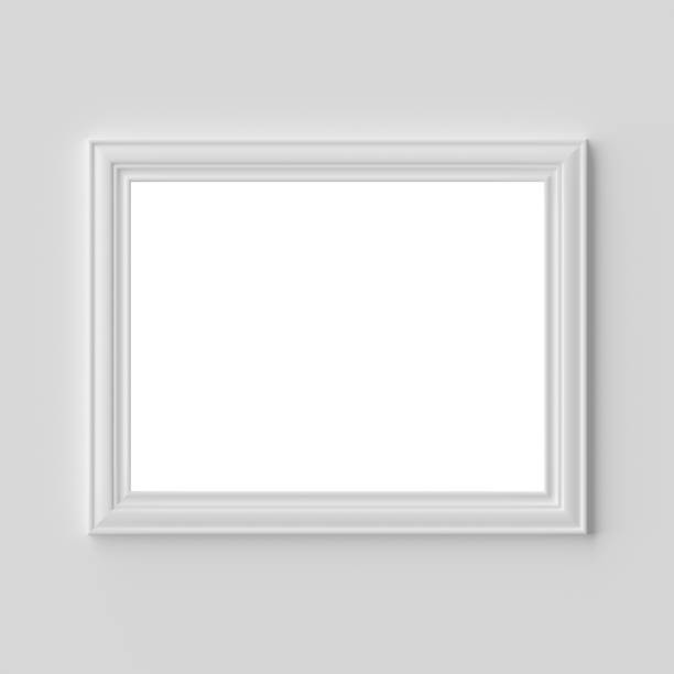 istock White photo or picture frame on white wall horizontal with copy-space 1161515969