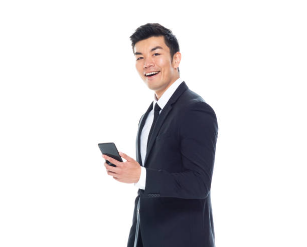 istock Handsome Chinese businessman -holding smart phone 1161517000