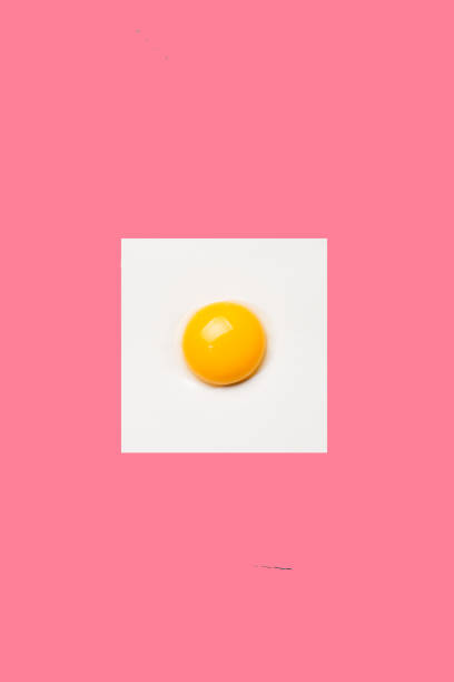 istock Square egg on pink background. Minimalistic design, colorful background 1161517149