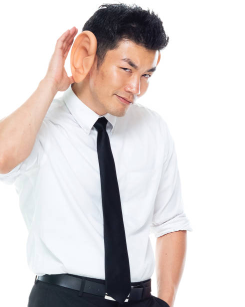 istock Handsome Asian Businessman - has big ears for listening 1161517228