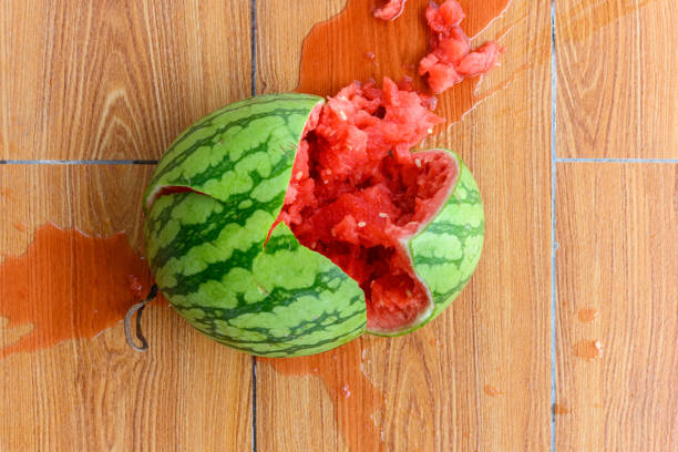 top view smashed watermelon on the ground stock photo