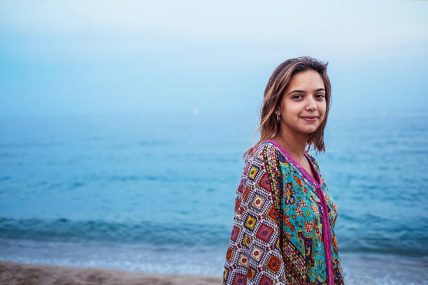 istock Pretty young girl at a Mediterranean beach 1161523283
